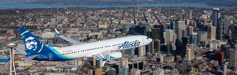 An Alaska Airlines plane flying over Seattle